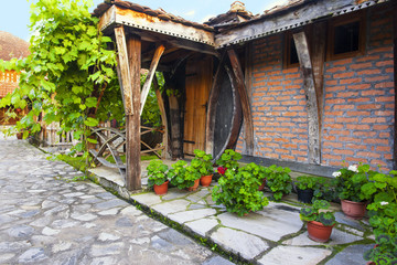 Fototapeta na wymiar Porch of a cottage with flowers