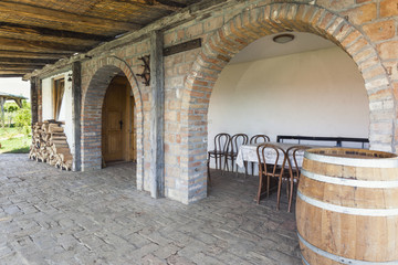 Table and chairs at the back of a winery
