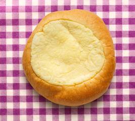 Round sour cream dessert bun