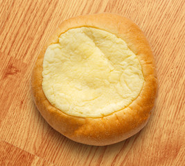 Round sour cream dessert bun