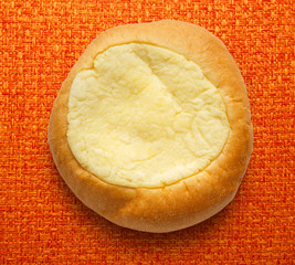 Round sour cream dessert bun