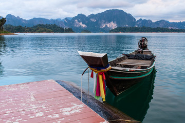 Longtail boat in lake . Ratchaprapha Dam at Khao Sok National Pa