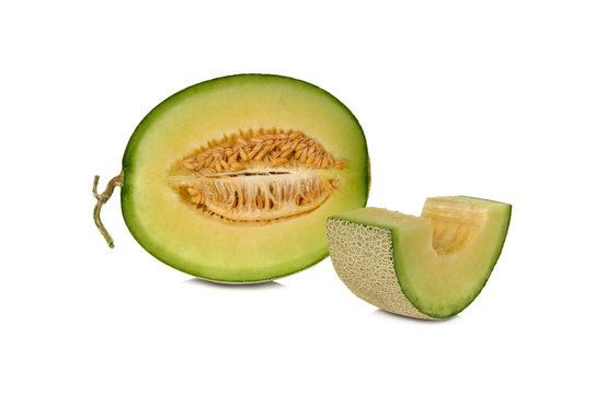 ripe green cantaloupe melon with stem on white background