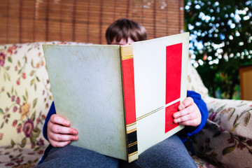 Child reader in the garden