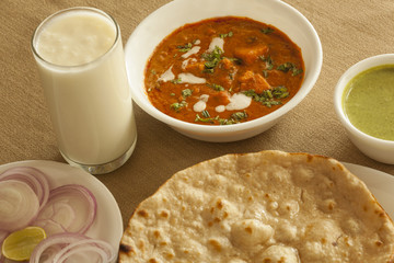 Paneer butter masala with tandoori roti and sweet lassi