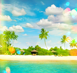 Tropical island sand beach with palm trees. Sunny blue sky with