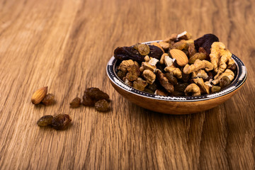 Granola  with nuts, dried apricotsy, raisins. Selective focus