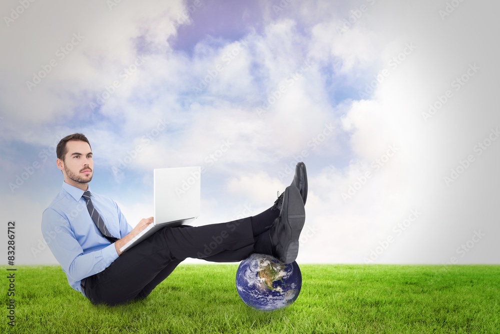 Poster composite image of businessman using laptop