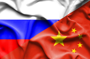 Waving flag of China and Russia