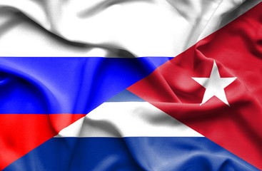 Naklejka premium Waving flag of Cuba and Russia