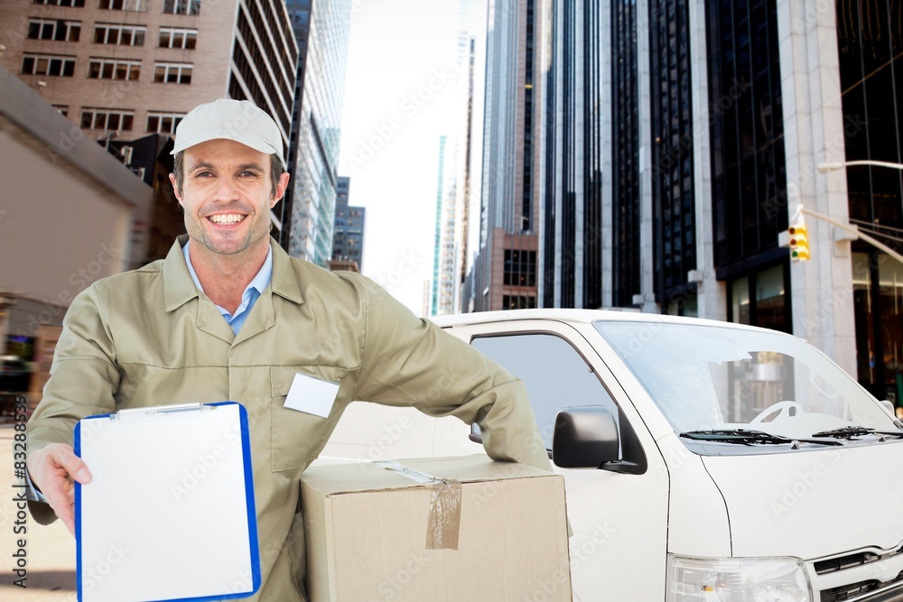 Poster Composite image of happy delivery man with box showing clipboard