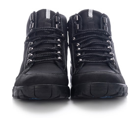 A pair of new hiking boots on white background - obrazy, fototapety, plakaty