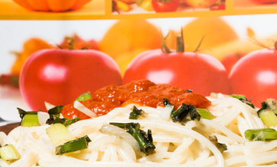 Pasta with tomato sauce close-up