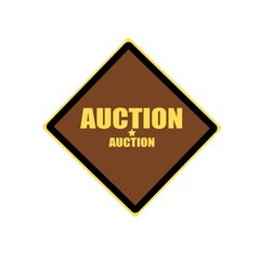 Obraz premium AUCTION yellow stamp text on brown background