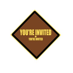 Obraz premium You are invited yellow stamp text on brown background