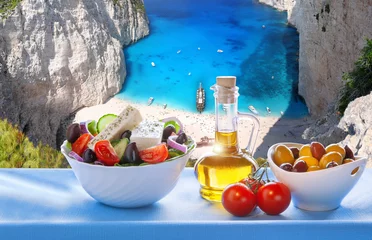 Papier Peint photo autocollant Plage de Navagio, Zakynthos, Grèce  Navagio beach with Greek salad in Zakynthos, Greece