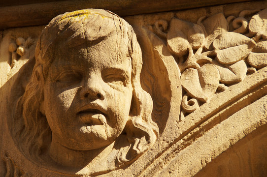 Jugendstil Putte - nachdenklicher Kopf