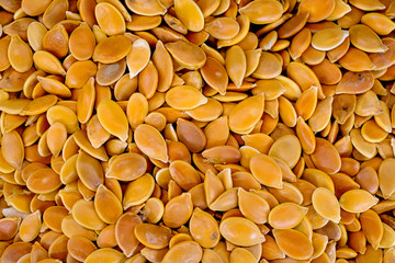 Close-up of pumpkin seeds. Food background.