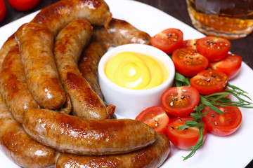 German sausages with tomato and beer