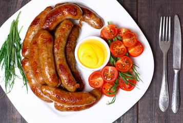 German sausages with tomato and beer
