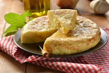 Spanish omelette with potato and egg - obrazy, fototapety, plakaty