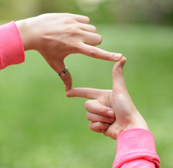 Close up of hands making frame gesture