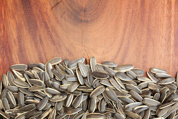 Sunflower seed on wooden background