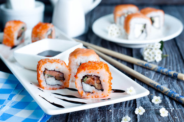 Sushi roll on white plate,