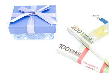 blue gift box and money on white
