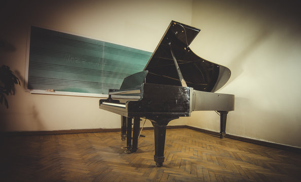 An Image of Music Room. Piano in class.
