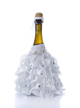 Champagne wedding bottles in suit festive decoration isolated