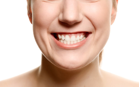 Smiling woman showing her teeth