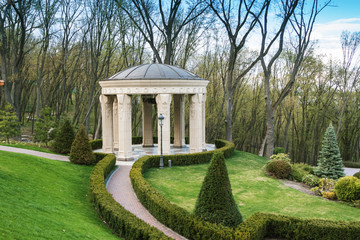 beautiful antic arbor in garden