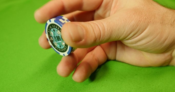 A player plays with four chips and puts them at the end on the table