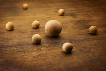 Wooden spheres representing a planetary  formation.