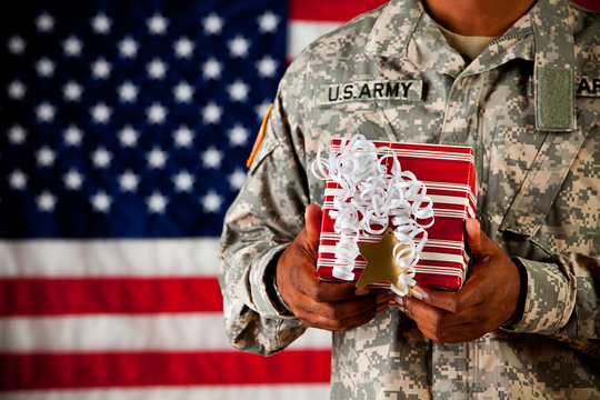 Soldier: Holding a Wrapped Gift