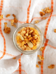 homemade granola in glass jar above