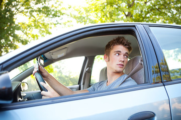 Driving: Driver Turning and Holding Cell Phone
