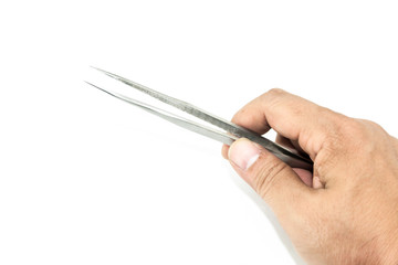 hand holding metal tweezers isolate