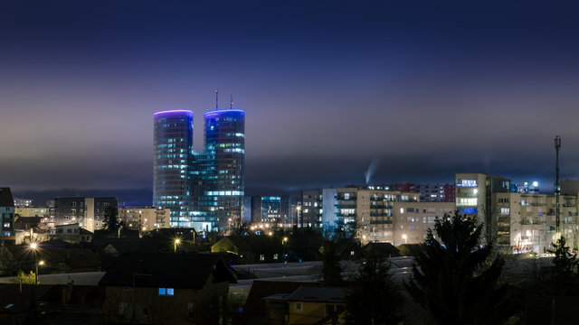 Fototapeta Night cityscape with urban skyline