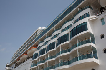 White Cruise ship docked in a port