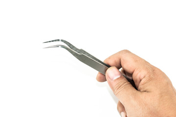 hand holding metal tweezers isolate