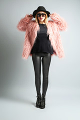 Expressive young model on gray background