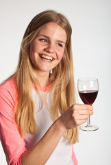 Scandinavian cute young girl drinking wine