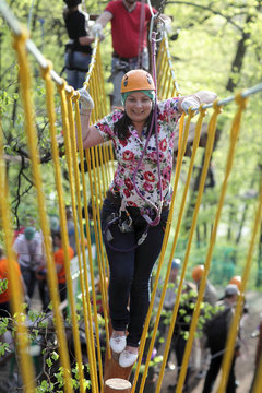 Person on a rope climbing