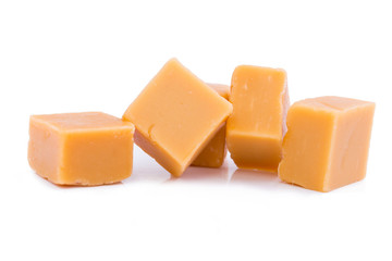 Tasty toffees on a white background.