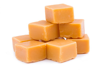 Tasty toffees on a white background.