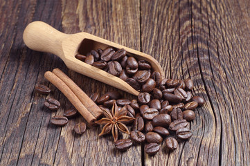 Coffee beans and wooden scoop