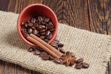 Bowl with coffee beans, cinnamon and anise