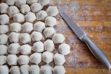 Raw Meat dumplings Russian traditional pelmeni with meat